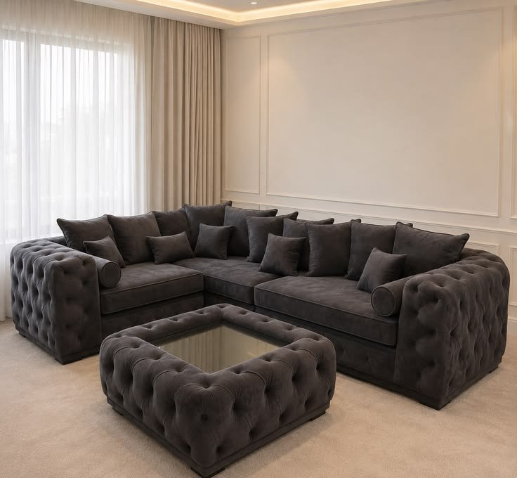 Cheterfield black corner sofa with center table
